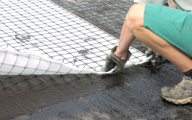 Vyztuženie asfaltových vrstiev v Ostrave