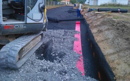 Zosilnenie podkladovej vrstvy komunikácie pri Šebetove